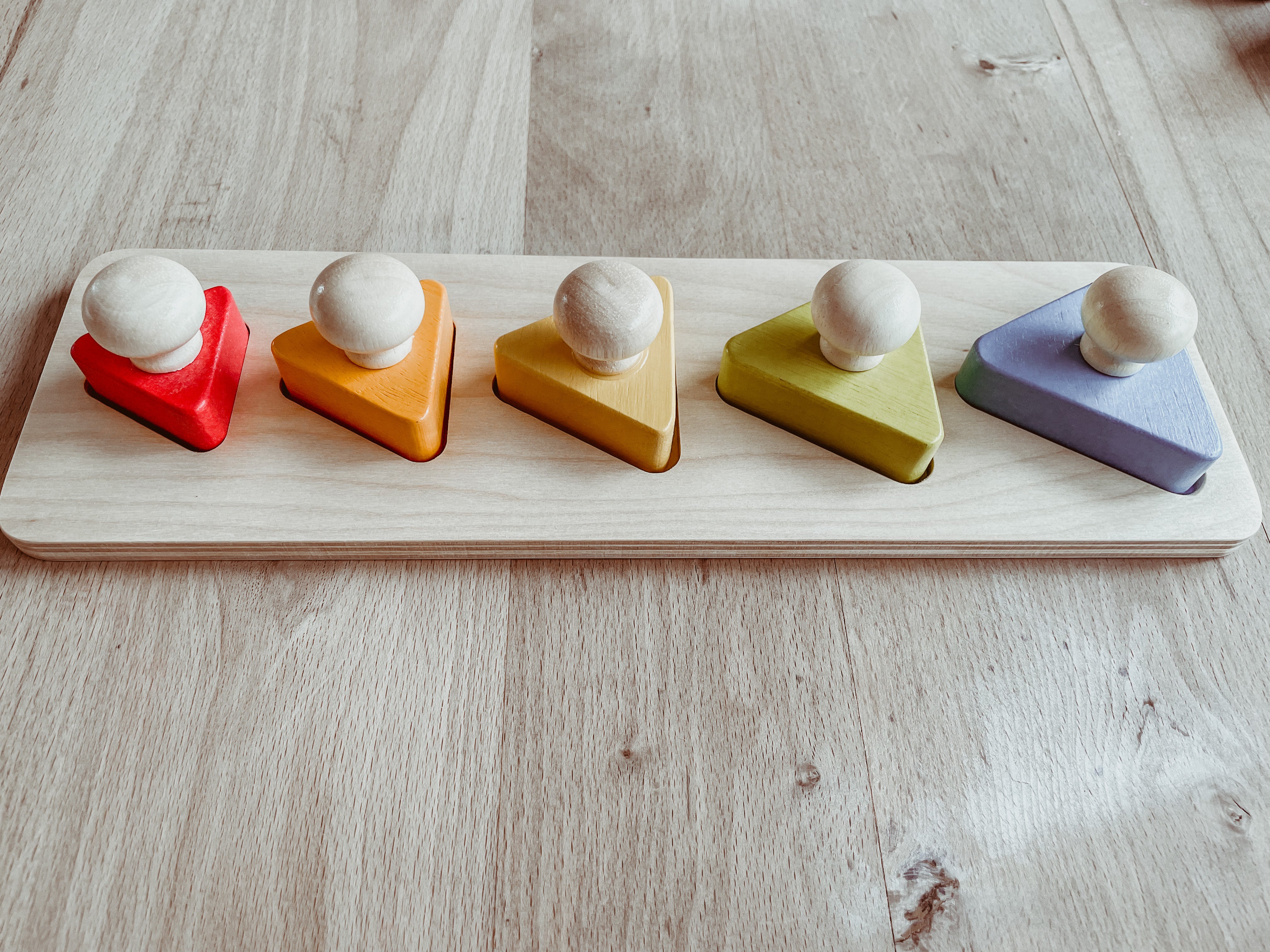 Montessori puzzel met driehoeken