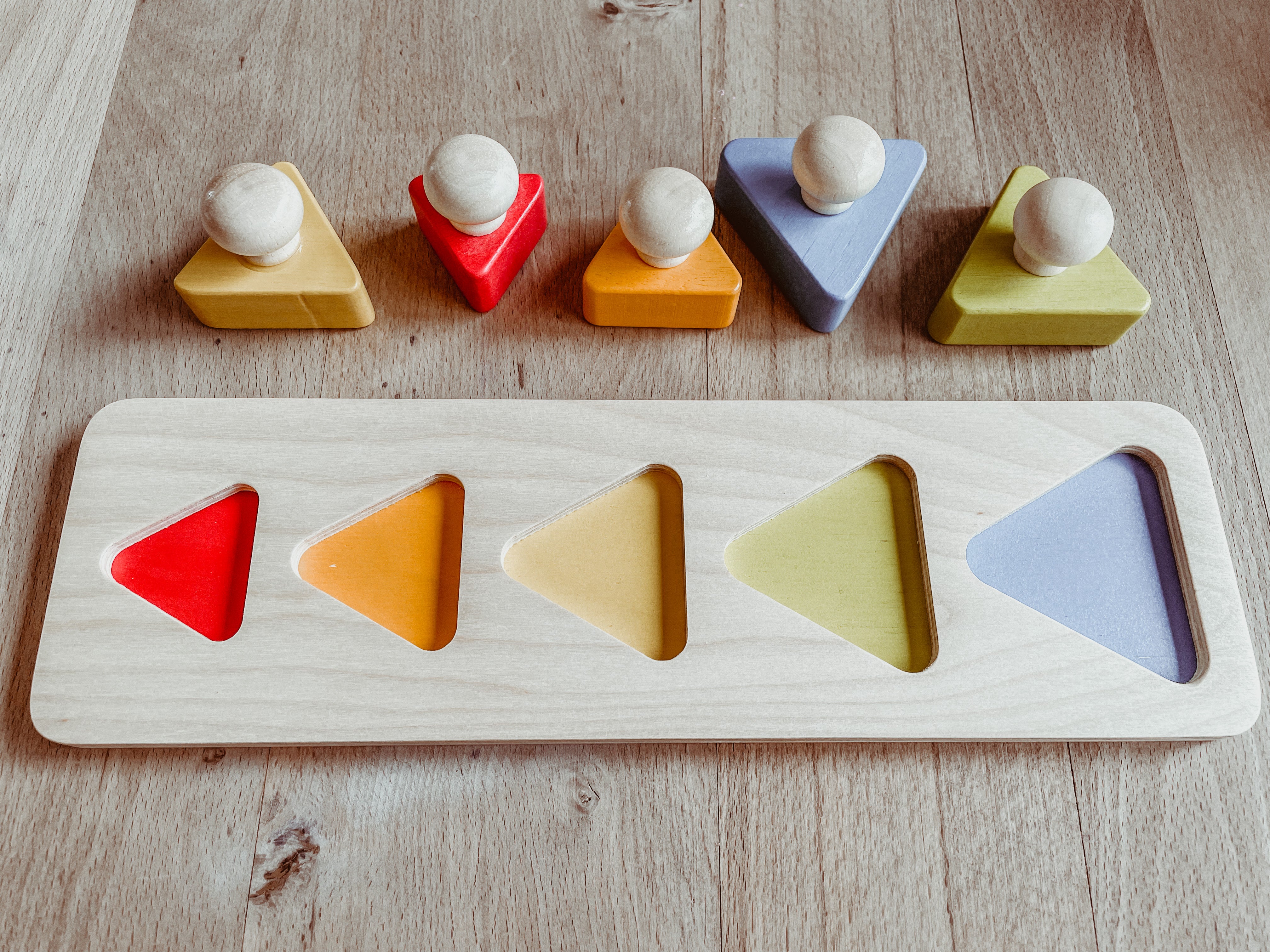 Montessori puzzel met driehoeken