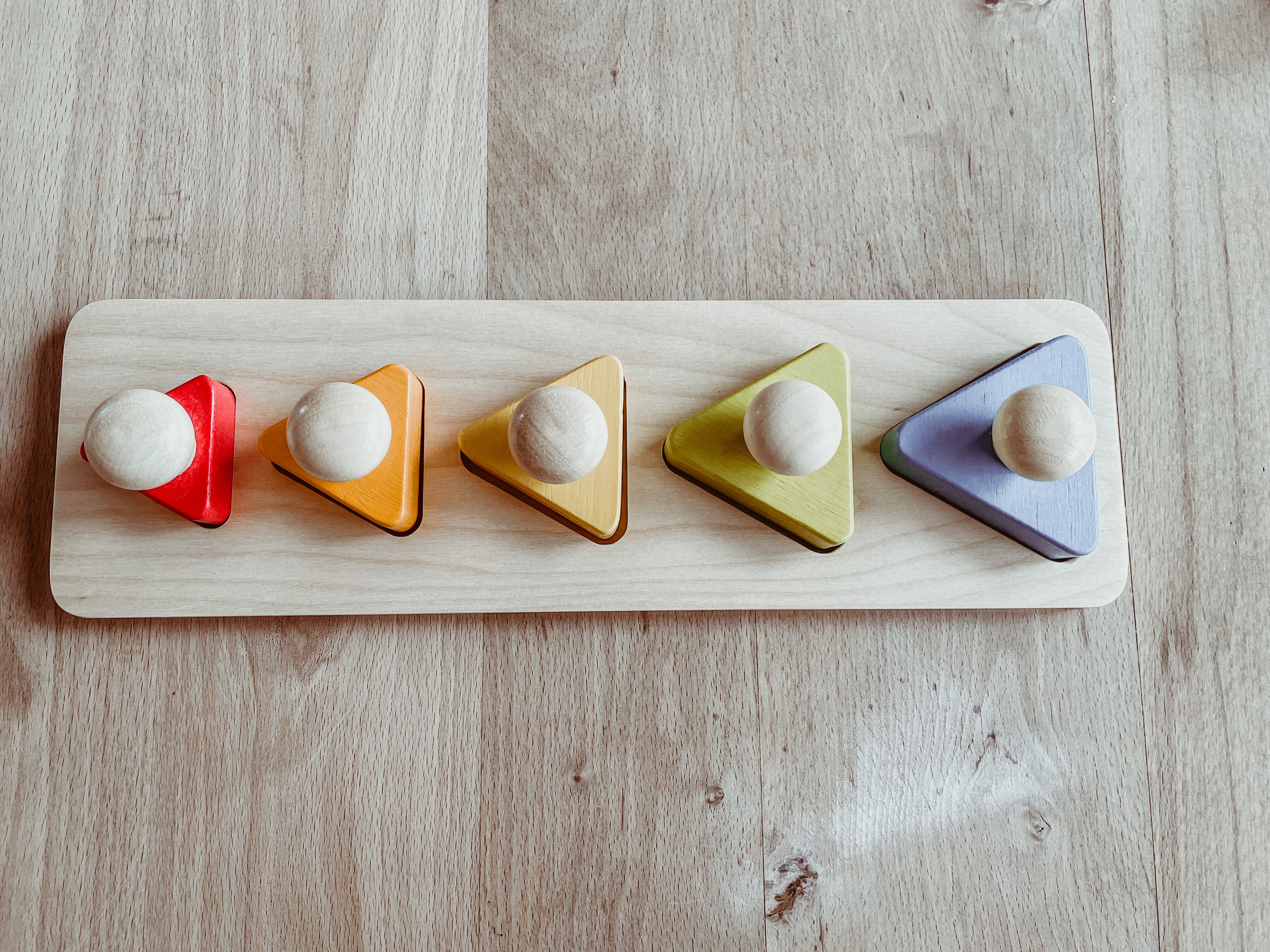 Montessori puzzel met driehoeken